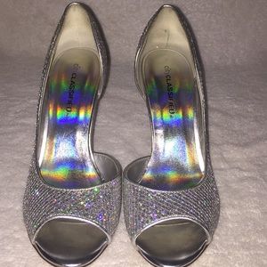 CityCLASSIFIED Silver Heels, size 7.